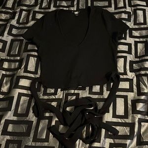 cute black cropped shirt that ties around waist